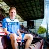 Martin agrees new deal
