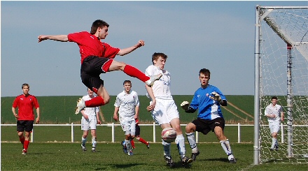 John MacDonald challenges for the ball v Montrose John MacDonald challenges for the ball v Montrose