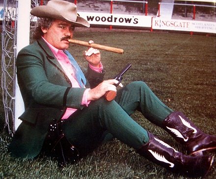 Jim Leishman in boots with cigar Jim Leishman in boots with cigar