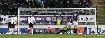 Mark Miller scores from the penalty spot Mark Miller scores from the penalty spot