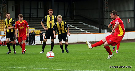 Andy Kirk scores from the spot Andy Kirk scores from the spot