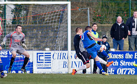 David McKenna sticks away number three David McKenna sticks away number three