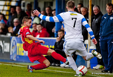 Josh Falkingham tackles Mortons Tony Wallace Josh Falkingham tackles Mortons Tony Wallace