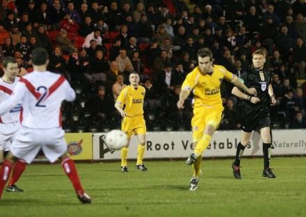 Graeme Holmes fires home Graeme Holmes fires home
