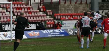 Steven Bell heads in goal for 1-2 Steven Bell heads in goal for 1-2
