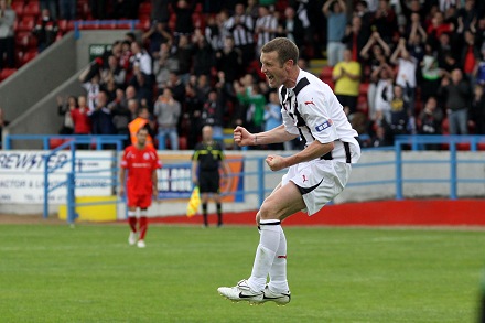 Andy Kirk celebrates his hat-trick Andy Kirk celebrates his hat-trick