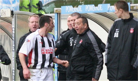 Stephen Glass has a quick word with the Dons bench Stephen Glass has a quick word with the Dons bench