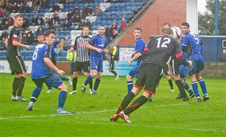 Robert Thomson tries to head home Robert Thomson tries to head home