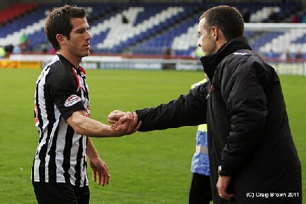 Liam Buchanan is thanked by Jim McIntyre Liam Buchanan is thanked by Jim McIntyre